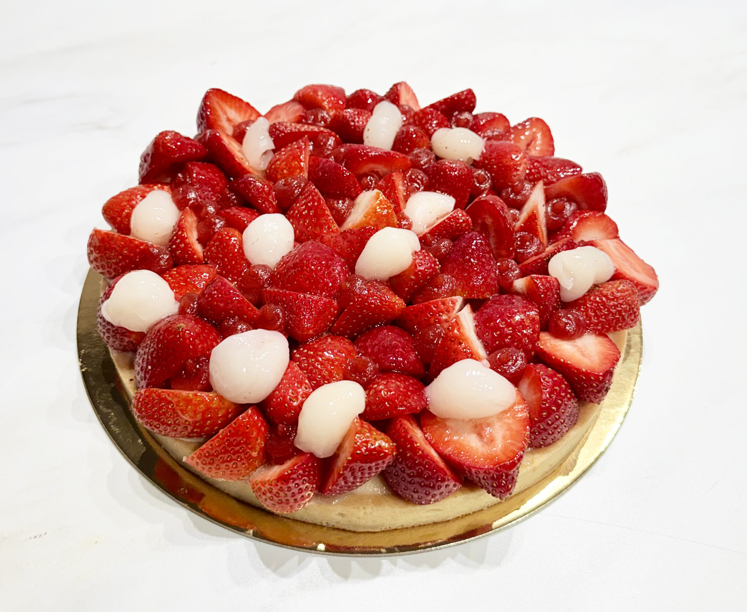 Large strawberry lychee tart